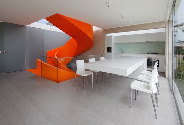 Flashy-Orange-Staircase-in-Modern-Home-7