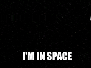 gif z gry portal 2, przelatujący robot, powtarzający "I'm in space"