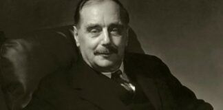Herbert George Wells siedzący na fotelu