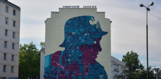 Mural na Woli, przedstawiający Powstańca z profilu