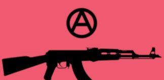 Logo organizacji TQILA, ktora broni srodowisk LGBT w Syrii i na bliskim wschodzie. Czarny maszynowy karabin AK47 na rozowym tle. Nad nim umieszczone w kółku A.