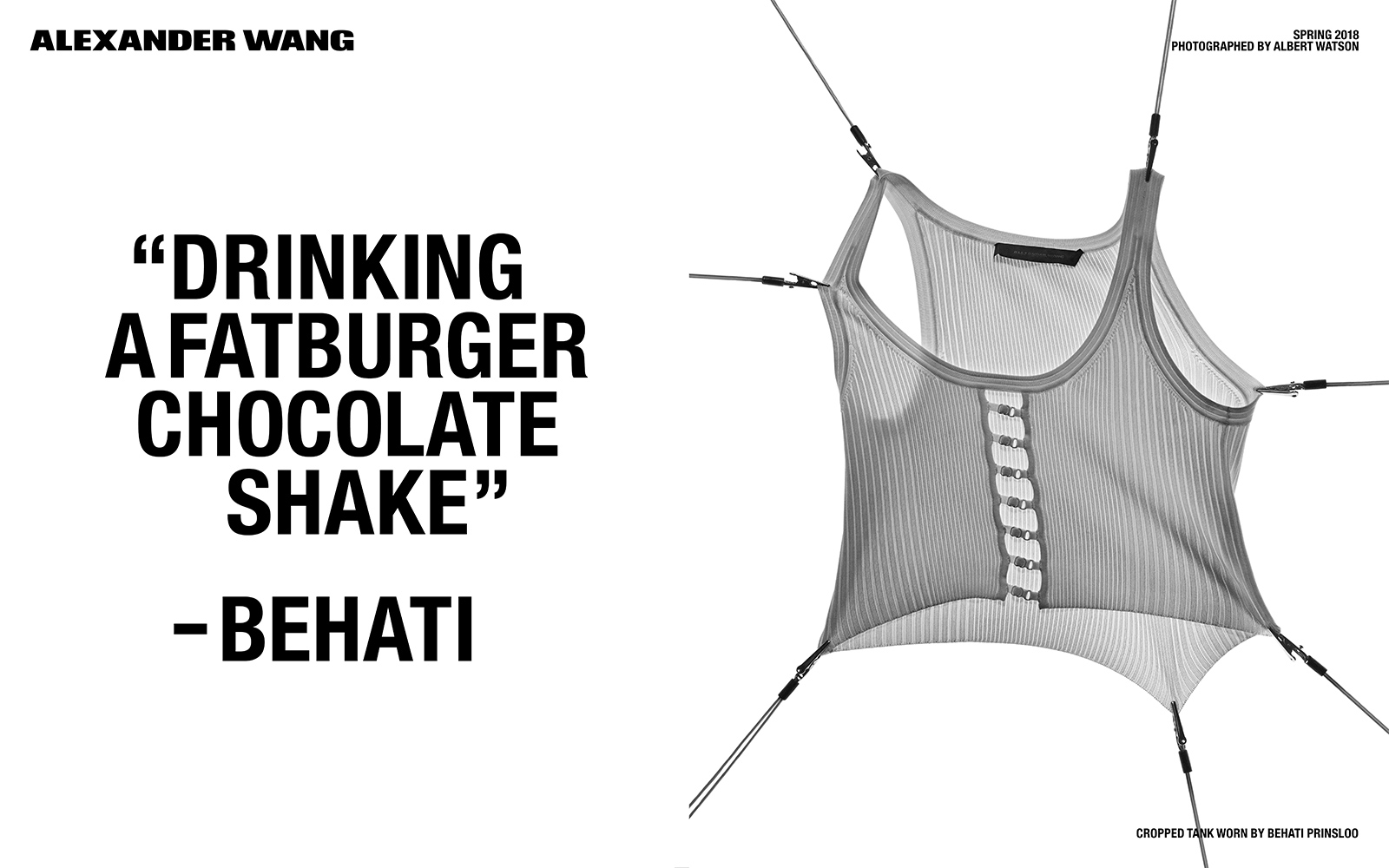 Przezroczysty top naciągnięty z sześciu stron spinaczami, obok cytat "drinking a fatburger chocolate shake"-Behati
