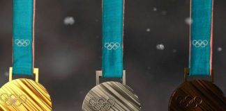 Trzy medale obok siebie: złoty, srebrny i brązowy