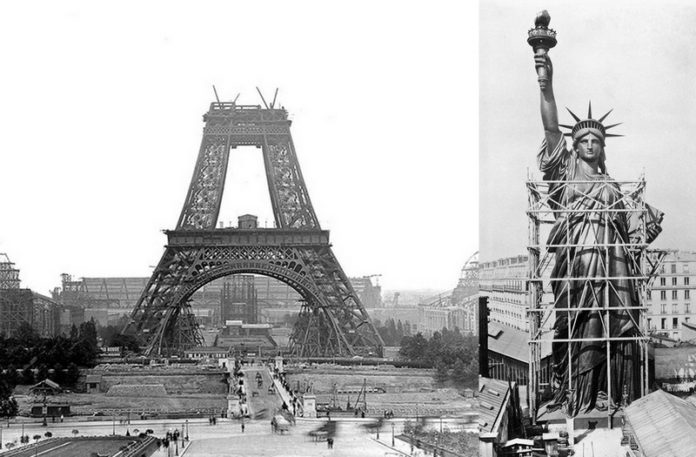 Wieża Eiffela w trakcie budowy i statua wolności