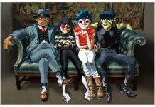 Kreskówkowe avatary zespołu Gorillaz siedzące na kanapie
